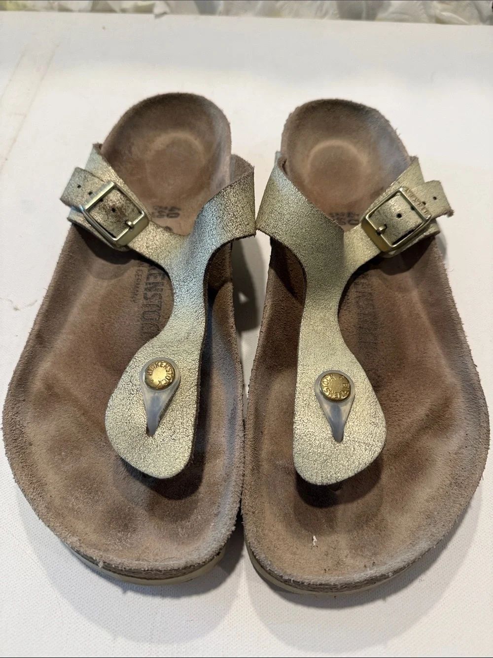 Birkenstock Metallic Gold Toe-Post Sandals with Buckle Accent